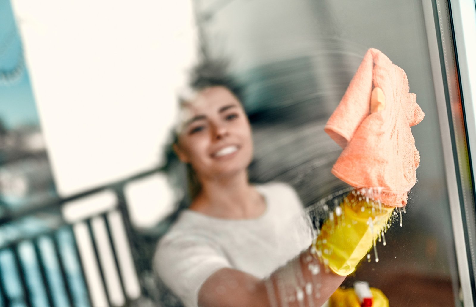Woman doing house cleaning.